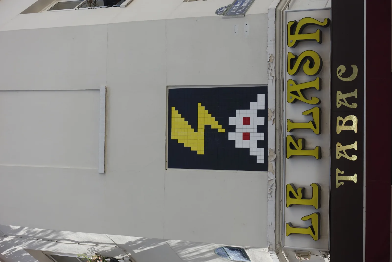 Invader mosaic photographed in Paris