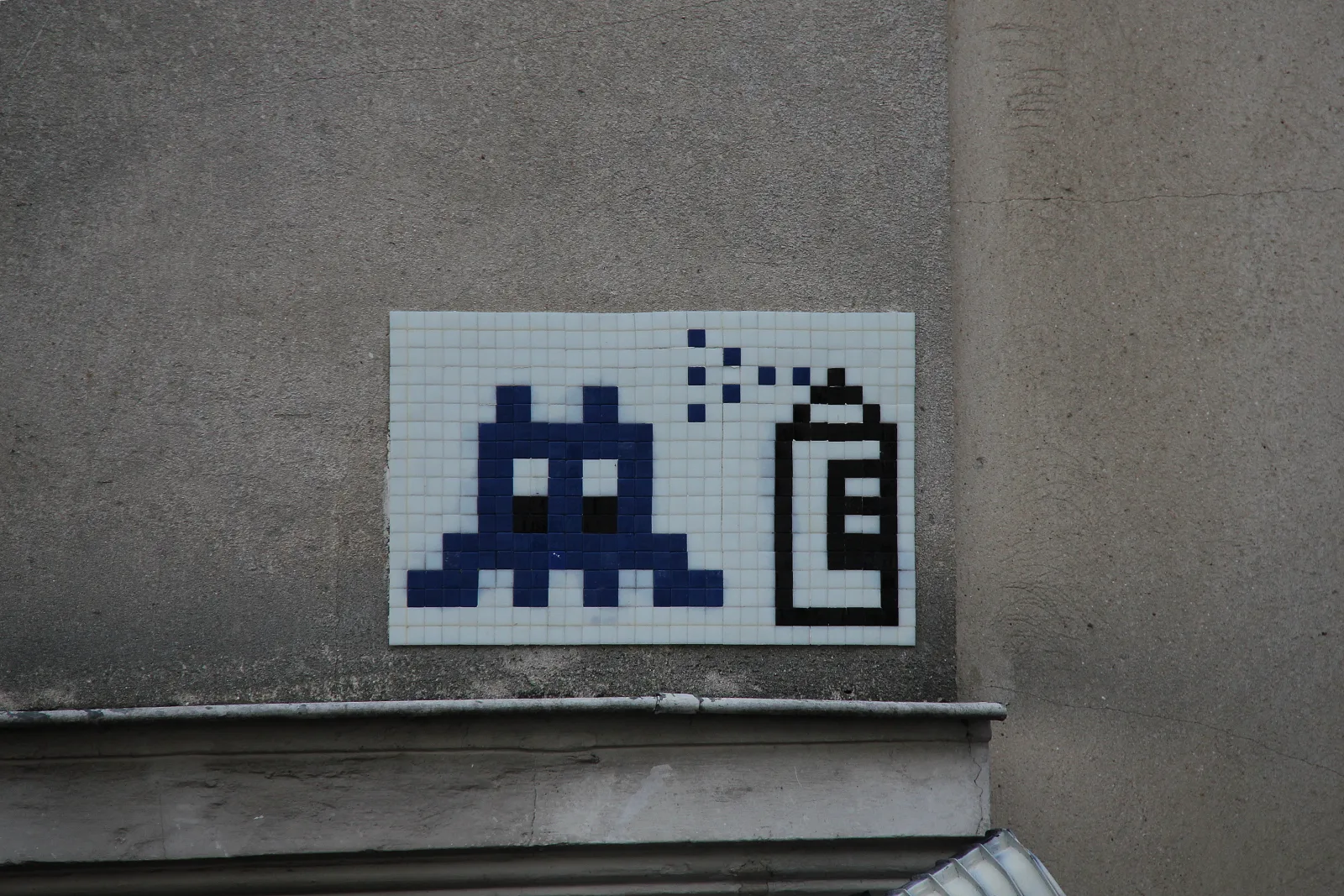 Pixel mosaic street art in Paris